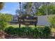 The Moorings community sign, welcoming residents and guests to this waterfront property at 314 Moorings Cove Dr, Tarpon Springs, FL 34689