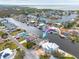 Aerial view showcasing home's waterfront location and neighborhood at 4207 Des Prez Ct, Hernando Beach, FL 34607
