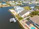 Aerial view of waterfront home with private dock and boat lift at 4207 Des Prez Ct, Hernando Beach, FL 34607