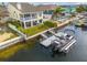 Aerial view of waterfront home with private dock and boat at 4207 Des Prez Ct, Hernando Beach, FL 34607