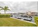 Private backyard with dock and access to the waterway at 4207 Des Prez Ct, Hernando Beach, FL 34607