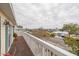 Wooden balcony with views of the neighborhood and waterfront at 4207 Des Prez Ct, Hernando Beach, FL 34607