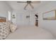 Bright bedroom with a king-size bed and built-in closet at 4207 Des Prez Ct, Hernando Beach, FL 34607