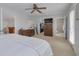 Primary bedroom with king bed and ensuite bathroom at 4207 Des Prez Ct, Hernando Beach, FL 34607