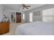 Large bedroom with king bed, walk-in closet, and ensuite bath at 4207 Des Prez Ct, Hernando Beach, FL 34607