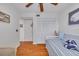 Guest bedroom with daybed, built-in shelving and hardwood floors at 4207 Des Prez Ct, Hernando Beach, FL 34607
