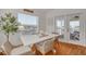 Bright dining area with waterfront views and access to balcony at 4207 Des Prez Ct, Hernando Beach, FL 34607