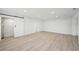 Finished basement with updated flooring and barn door at 4318 1St S Ave, St Petersburg, FL 33711