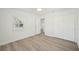 Bedroom featuring wood-look floors and double door closet at 4318 1St S Ave, St Petersburg, FL 33711