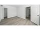 Bright bedroom with wood-look flooring and spacious closet at 4318 1St S Ave, St Petersburg, FL 33711