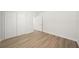 Well-lit bedroom with double door closet and wood flooring at 4318 1St S Ave, St Petersburg, FL 33711
