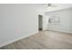 Bedroom with ceiling fan, window, and light flooring at 4318 1St S Ave, St Petersburg, FL 33711