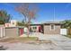 Updated bungalow with red door and detached shed at 4318 1St S Ave, St Petersburg, FL 33711