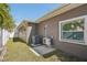 Side view of the house showcasing a neat lawn and AC unit at 4318 1St S Ave, St Petersburg, FL 33711