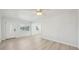 Spacious living area with wood-look floors and updated finishes at 4318 1St S Ave, St Petersburg, FL 33711