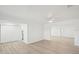 Bright and airy living room with light flooring and ceiling fan at 4318 1St S Ave, St Petersburg, FL 33711