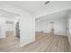 Bright living room with light wood floors and large window at 4318 1St S Ave, St Petersburg, FL 33711