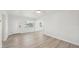 Spacious living area with hardwood floors and a view of the front yard at 4318 1St S Ave, St Petersburg, FL 33711