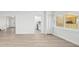 Open concept living room with new flooring and lots of natural light at 4318 1St S Ave, St Petersburg, FL 33711