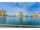 Aerial view of waterfront community with multiple buildings and lush landscaping at 4725 Cove Cir # 211, St Petersburg, FL 33708