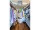 Well-organized walk-in closet with ample shelving at 4725 Cove Cir # 211, St Petersburg, FL 33708
