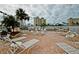 Spacious pool deck area with lounge chairs at 4725 Cove Cir # 211, St Petersburg, FL 33708