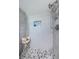 Modern shower with pebble floor and niche at 4725 Cove Cir # 211, St Petersburg, FL 33708