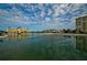 Stunning reflection of waterfront buildings in calm water at 4725 Cove Cir # 211, St Petersburg, FL 33708