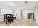 Small dining area with table and chairs near entryway at 503 Old Mill Pond Rd, Palm Harbor, FL 34683