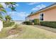 Landscaped backyard with lush greenery and water views at 5253 Brighton Shore Dr, Apollo Beach, FL 33572