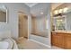 Spa-like bathroom featuring a large walk-in shower and a separate tub at 5253 Brighton Shore Dr, Apollo Beach, FL 33572