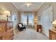 Bright bedroom with water views, hardwood floors, and ample natural light at 5253 Brighton Shore Dr, Apollo Beach, FL 33572