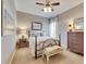 Bedroom with metal bed frame and neutral decor at 5253 Brighton Shore Dr, Apollo Beach, FL 33572