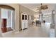 Elegant entryway with decorative furniture and view to living areas at 5253 Brighton Shore Dr, Apollo Beach, FL 33572