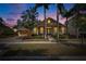 Attractive home exterior at dusk, showcasing curb appeal at 5253 Brighton Shore Dr, Apollo Beach, FL 33572