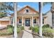 Welcoming exterior features a porch and landscaping at 5253 Brighton Shore Dr, Apollo Beach, FL 33572