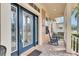 Relaxing front porch with rocking chairs and view at 5253 Brighton Shore Dr, Apollo Beach, FL 33572