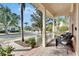 Front porch with seating area and neighborhood view at 5253 Brighton Shore Dr, Apollo Beach, FL 33572