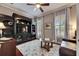 Relaxing home office with built-in shelving and a leather couch at 5253 Brighton Shore Dr, Apollo Beach, FL 33572