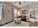 Home office featuring a comfortable leather couch and large windows at 5253 Brighton Shore Dr, Apollo Beach, FL 33572