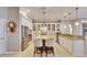 Spacious kitchen with center island, white cabinets, and granite countertops at 5253 Brighton Shore Dr, Apollo Beach, FL 33572