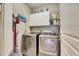 Convenient laundry room with washer, dryer, and ample storage at 5253 Brighton Shore Dr, Apollo Beach, FL 33572