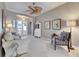Bright living room features comfortable seating and a view to the entryway at 5253 Brighton Shore Dr, Apollo Beach, FL 33572
