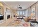 Comfortable living room with fireplace and large windows at 5253 Brighton Shore Dr, Apollo Beach, FL 33572