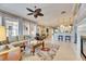 Open floor plan living room with kitchen view at 5253 Brighton Shore Dr, Apollo Beach, FL 33572