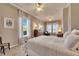 Main bedroom with water view and sitting area at 5253 Brighton Shore Dr, Apollo Beach, FL 33572