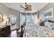 Main bedroom with water views and a king-size bed at 5253 Brighton Shore Dr, Apollo Beach, FL 33572