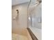 Large walk-in shower with multiple shower heads and tiled walls at 5253 Brighton Shore Dr, Apollo Beach, FL 33572