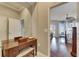 Vanity area with mirror and access to main bedroom at 5253 Brighton Shore Dr, Apollo Beach, FL 33572