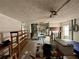 Unfinished garage with workbenches and storage at 6437 1St Palm Pt, St Pete Beach, FL 33706